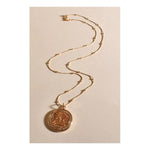 Gold Patterned Medallion Pendant Necklace by ADORNE